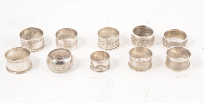 Lot 291 - Ten silver napkin rings.