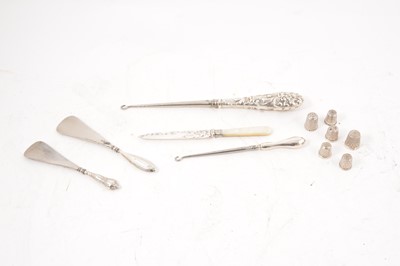 Lot 286 - Silver Thimbles, shoe horn, button hook etc.