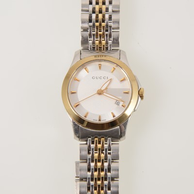 Lot 390 - Gucci - a lady's stainless steel wristwatch.