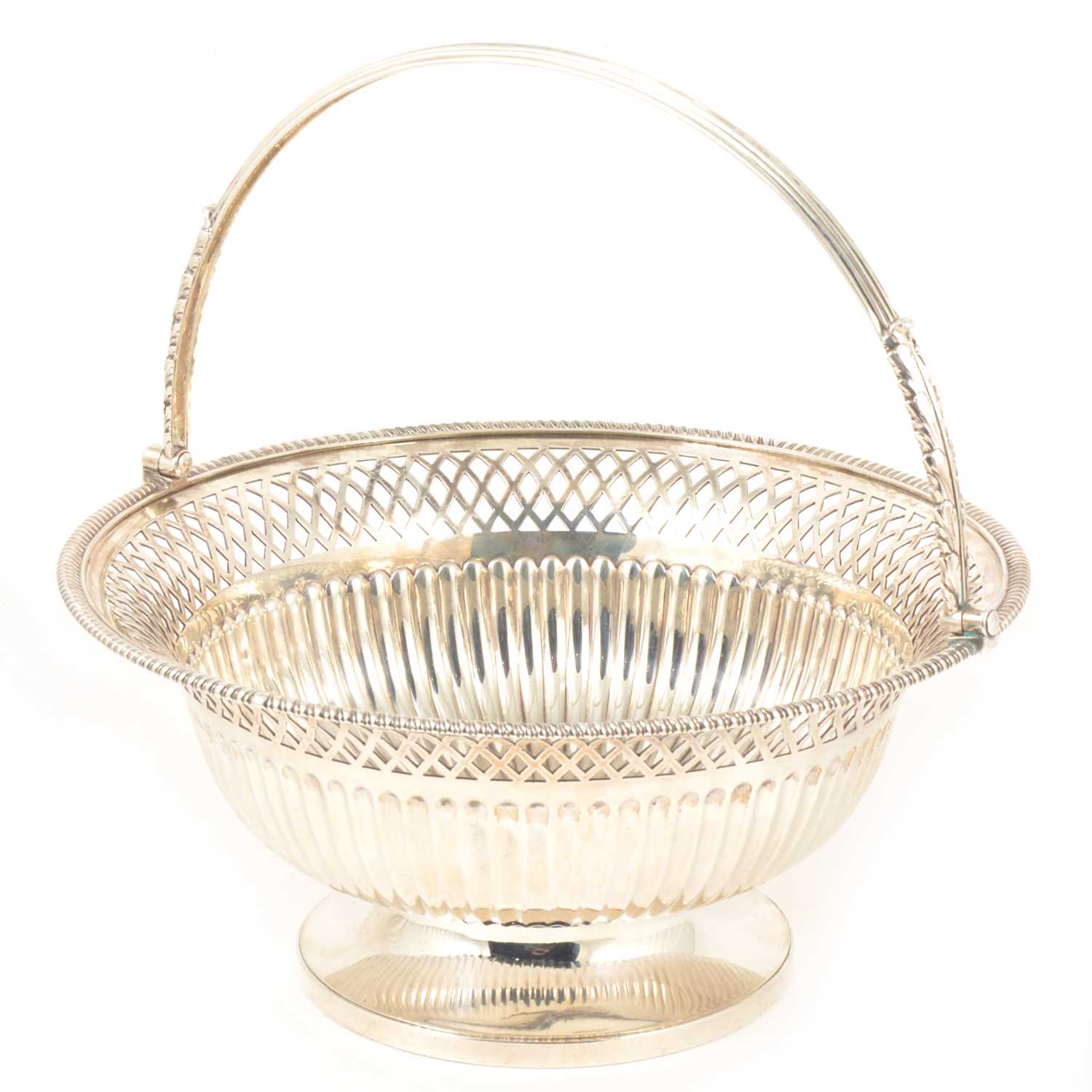 Lot 119 - A George III circular silver dessert basket