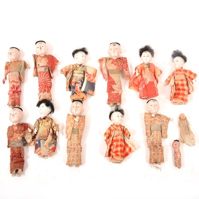 Lot 370 - Eleven early 20th century Chinese composition costume dolls