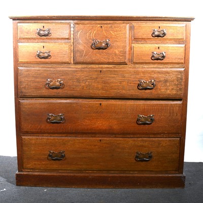 Lot 17 - An Edwardian oak chest of drawers.