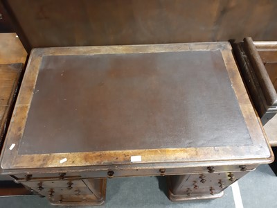 Lot 2 - A Victorian burr walnut twin pedestal desk.