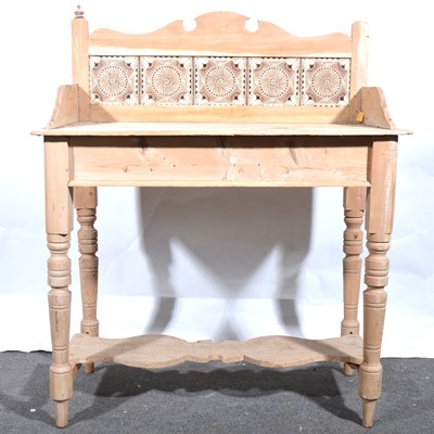 Lot 6 - A stripped pine washstand with tile back.