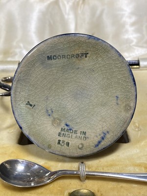 Lot 15 - A three-piece silver-mounted William Moorcroft 'Pomegranate' pattern cruet
