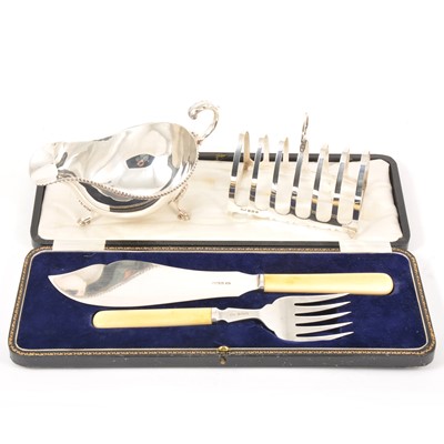 Lot 128 - Silver sauceboat, Barker Ellis Silver Co., Birmingham 1965, plus a silver toast rack and silver-bladed fish servers
