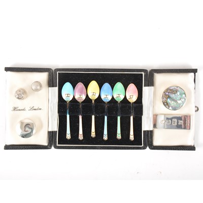 Lot 93 - A set of six silver gilt and enamel egg spoons