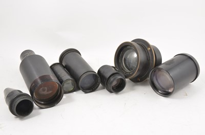 Lot 250 - Camera and projector lenses, two boxes of lenses of various types, including Wray London, Ross London etc