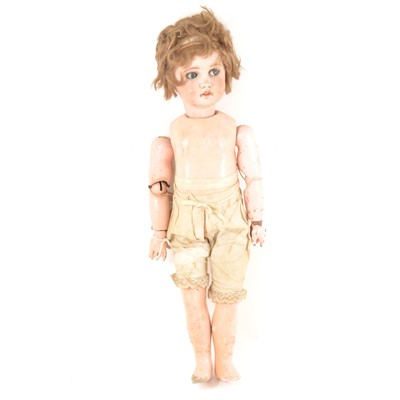 Lot 12 - A French SFBJ bisque head doll with walking and head turning mechanism.