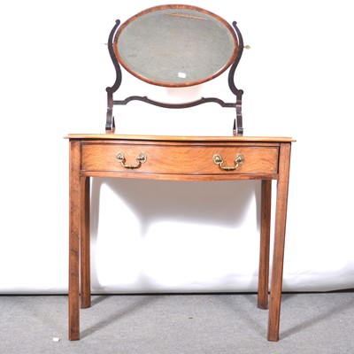 Lot 119 - A 19th Century mahogany dressing table with a single frieze drawer, and an oval dressing table mirror.