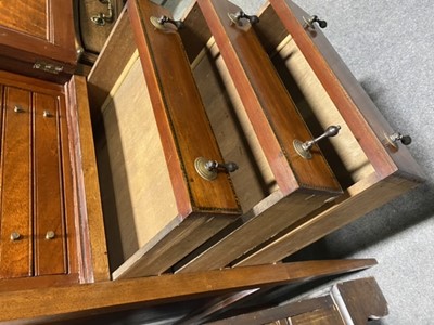 Lot 98 - An unusual mahogany slender canteen cabinet, and a twelve place setting of cutlery