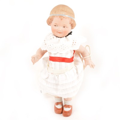 Lot 4 - A Gebruder Heubach bisque doll, girl body with bisque body and limbs, 48 stamp to back, 22.5cm tall.