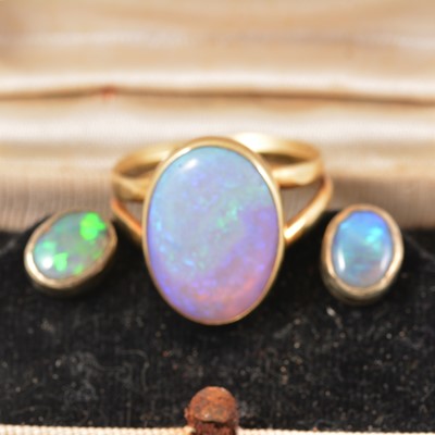 Lot 314 - An opal dress ring, pair of stud earrings and pendant.