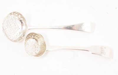 Lot 269 - Two Georgian silver sugar sifting spoons