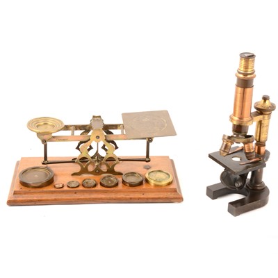 Lot 208 - Leitz monocular field microscope, and a set of postal scales and weights