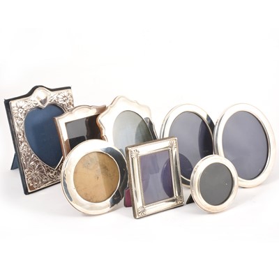 Lot 167 - A pair of silver oval photograph frames, Carr's of Sheffield, Sheffield 2005, plus six more of various sizes.