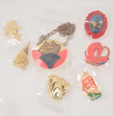 Lot 372 - Fourteen novelty vintage bakelite and ivorine brooches with a nautical theme, 1930's-50's