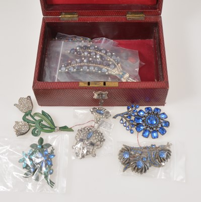 Lot 363 - Twelve pot metal brooches and dress clips - possibly by Brier USA, in a red jewel box with key