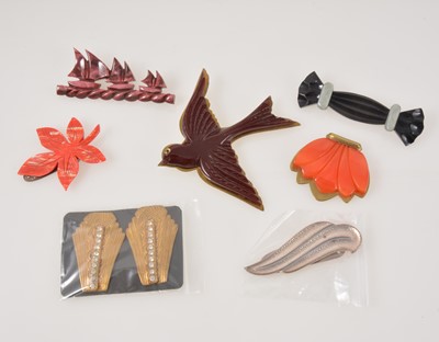 Lot 361 - Thirty vintage brooches and clips from the 1930's-1950's, bakelite, ivorine, gilt metal.