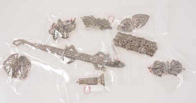 Lot 371 - A white metal alloy marcasite lizard brooch and fourteen brooches and dress clips