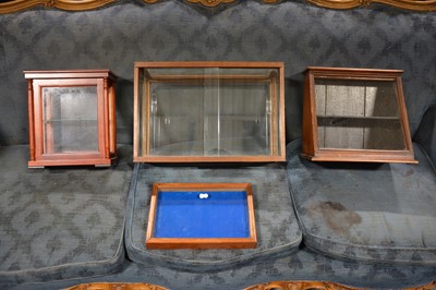Lot 605 - Three small glazed display cabinets and one table top display cabinet.