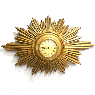 Lot 271A - Buren - A vintage Swiss sunburst wall clock