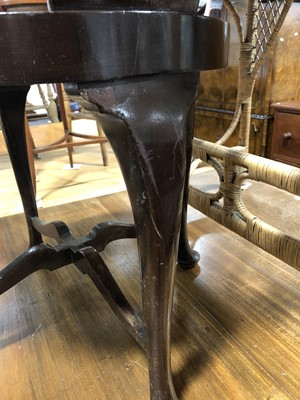 Lot 117 - An Edwardian walnut and leather upholstered armchair.