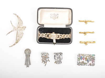 Lot 387 - A box of paste jewellery, some missing stones, cocktail watch.