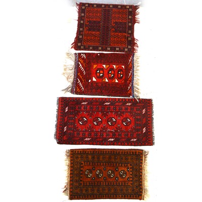 Lot 586 - Bokhara mat and three others