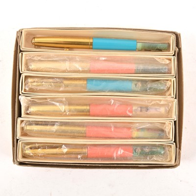 Lot 215 - A retailer's 1950's box of twelve as new novelty "Diana Special" fountain pens with bathing belles.