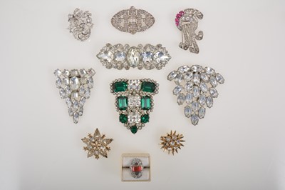 Lot 348A - A large Eisenberg dress clip, Trifari paste set fur clip, other large paste clips.