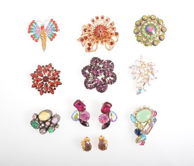 Lot 365 - Twenty-two vintage 1950's colourful paste brooches and earrings.