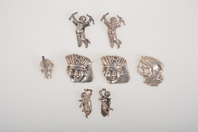 Lot 369 - Keim of London, and in the style of, a collection of eight white and silver metal clips and pins