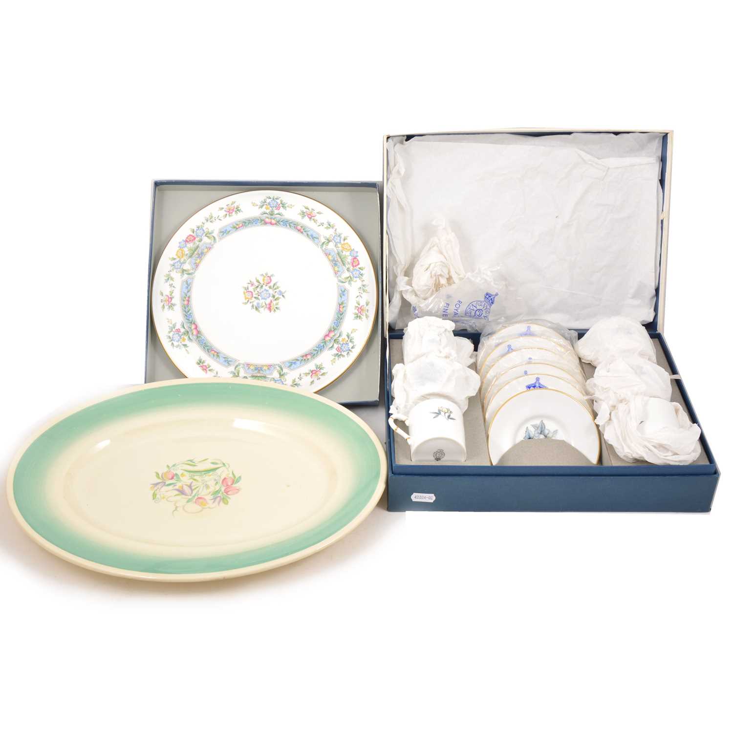 Lot 70 - A set of six Royal Worcester coffee cans, Worcester gateau plate, and Susie Cooper charger