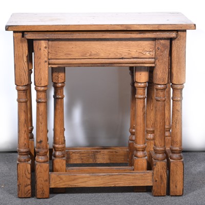 Lot 450 - Nest of oak coffee tables.