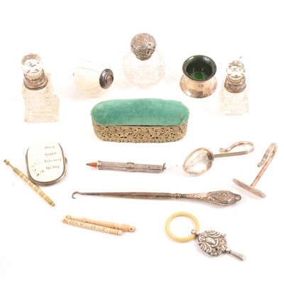 Lot 179 - A selection of silver and ivory items, to include a baby's spoon set, miniature purse, scent bottles etc.