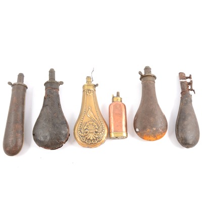 Lot 78 - Embossed brass shot flask, copper shot flask, and four other powder pouches
