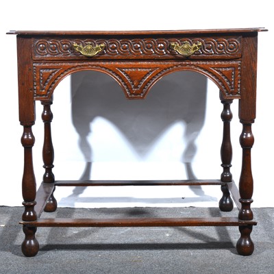 Lot 3 - A 19th century carved oak side table.