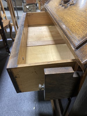 Lot 9 - An oak bureau bookcase.