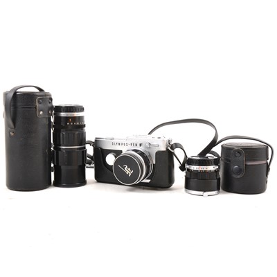 Lot 98 - Olympus Pen F 35mm camera and three lenses.