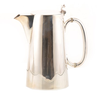 Lot 210 - A silver hot water jug/coffee pot by Charles & George Asprey. London 1904.