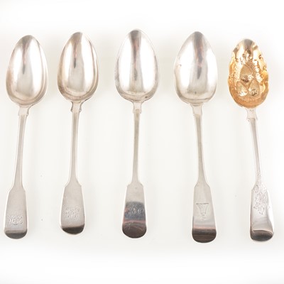 Lot 223 - Four silver table spoons and a berry spoon.