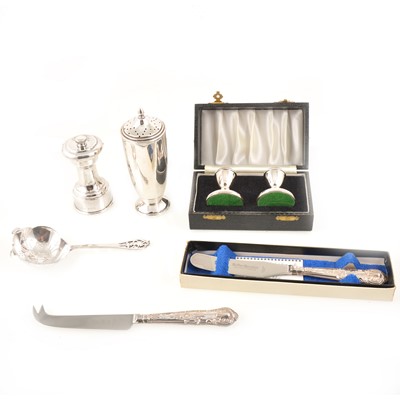 Lot 222 - A cased set of silver candlesticks, pepper mill, caster, flatware.