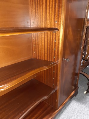 Lot 11 - A reproduction mahogany bookcase.