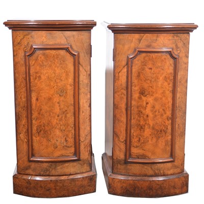 Lot 521 - A pair of Victorian figured walnut and walnut pedestals.