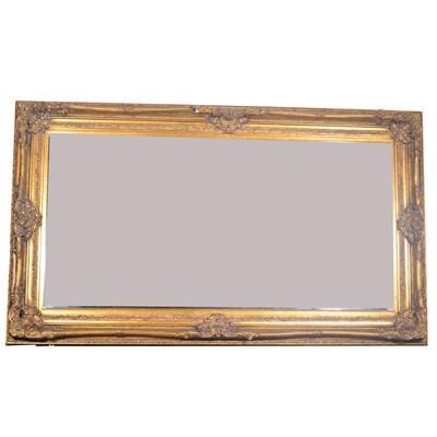 Lot 92 - A large gilt framed wall mirror.