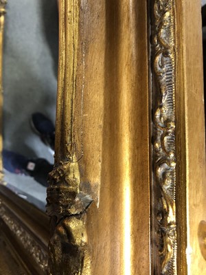 Lot 92 - A large gilt framed wall mirror.