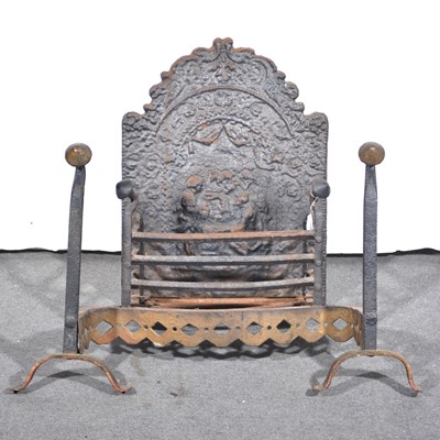 Lot 148 - An antique fire basket, with arched cast iron fireback.