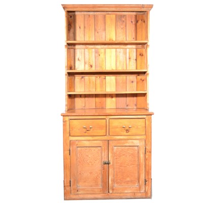 Lot 104 - A pine pantry cupboard with dresser top.