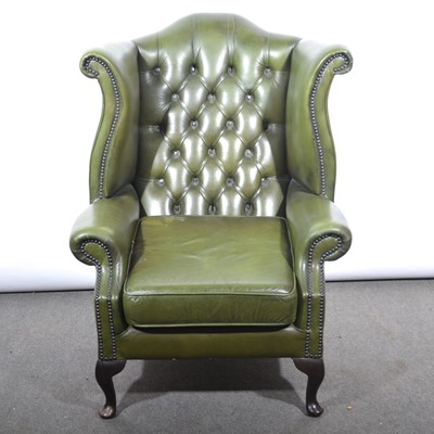 Lot 389 - Georgian style leather wingback chair.